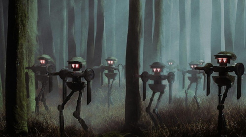 Group of tripod-style robots with glowing red eyes marching through a misty forest